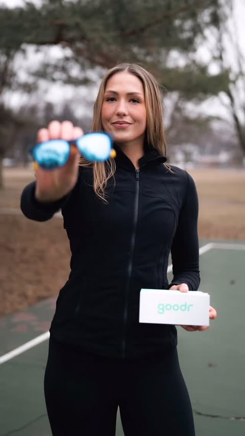 Instagram post by @ashley.sof for Goodr. Caption reads: [...] up in your colors. #marchenergy @sportsgoodr....