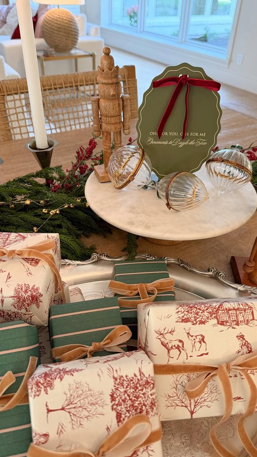 Instagram post by @aurelie.erikson for Hallmark. Caption reads: #ad Our annual ornament exchange night will....