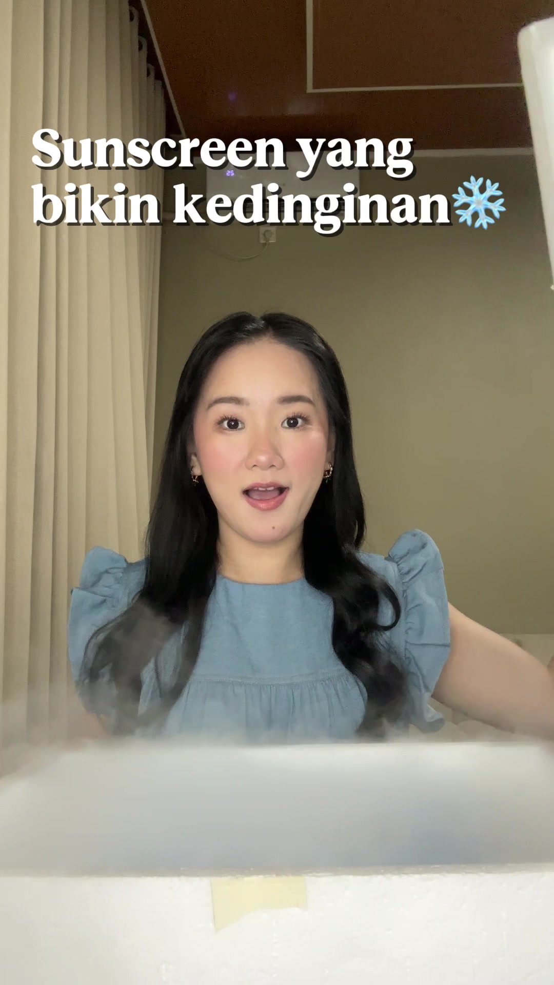 TikTok post by @karinaustinn for Garnier Indonesia. Caption reads: sunscreen dingin 💦❄️🙏🏻bikin kulit adem dan....