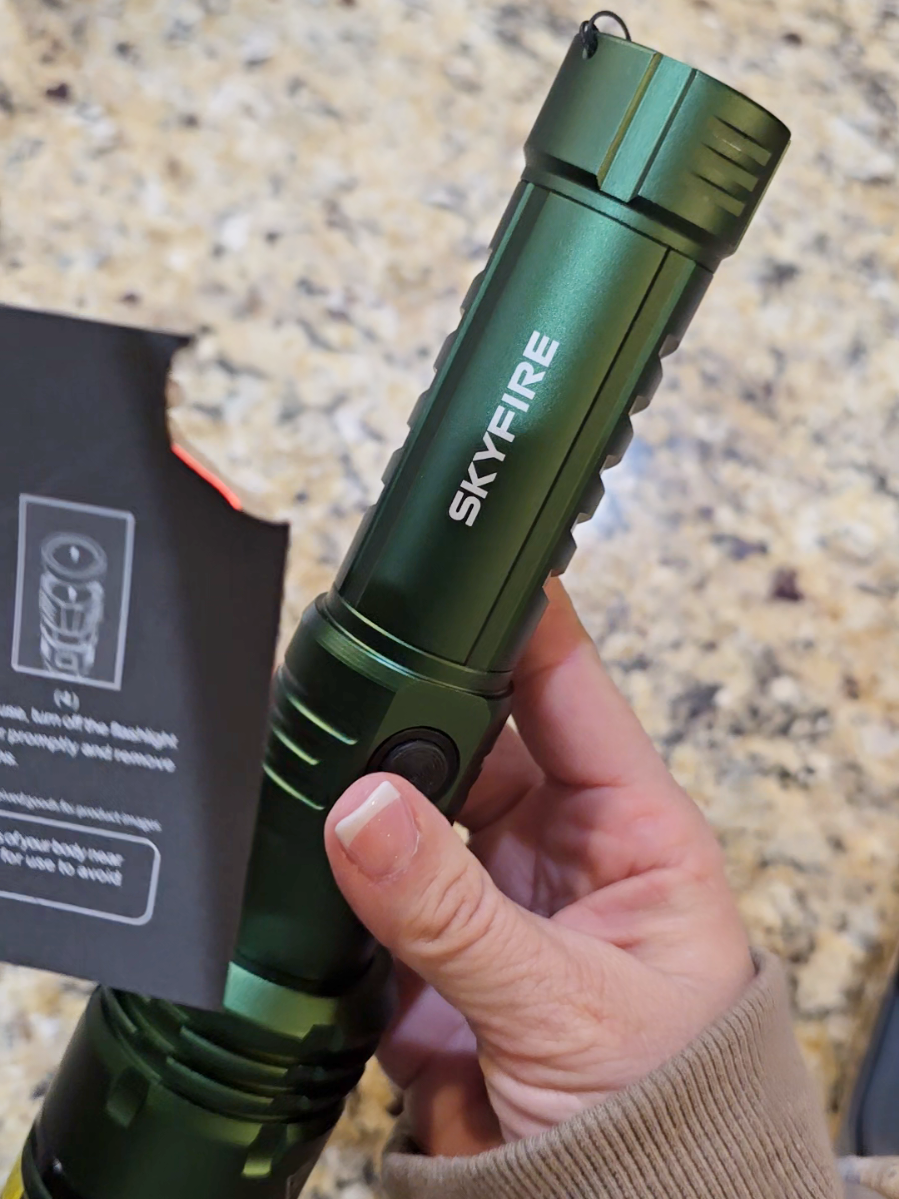 TikTok post by @kristiscustomcreations for Skyfire. Caption reads: [...] flashlight is amazing! #ledflashlight....
