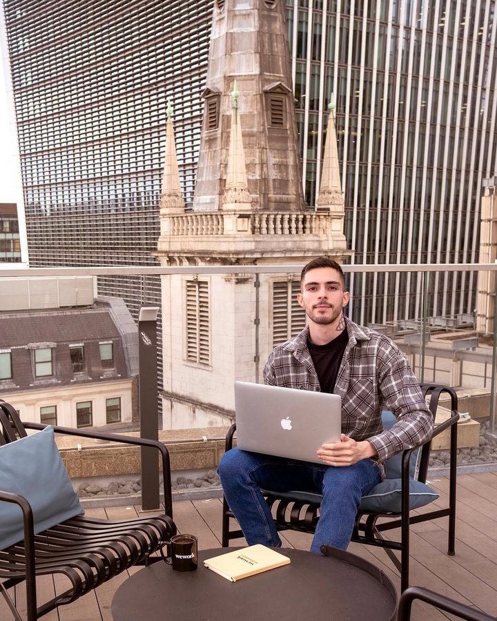 Instagram post by @lefterisanestis for WeWork. Caption reads: For me, working from home can be very distracting....