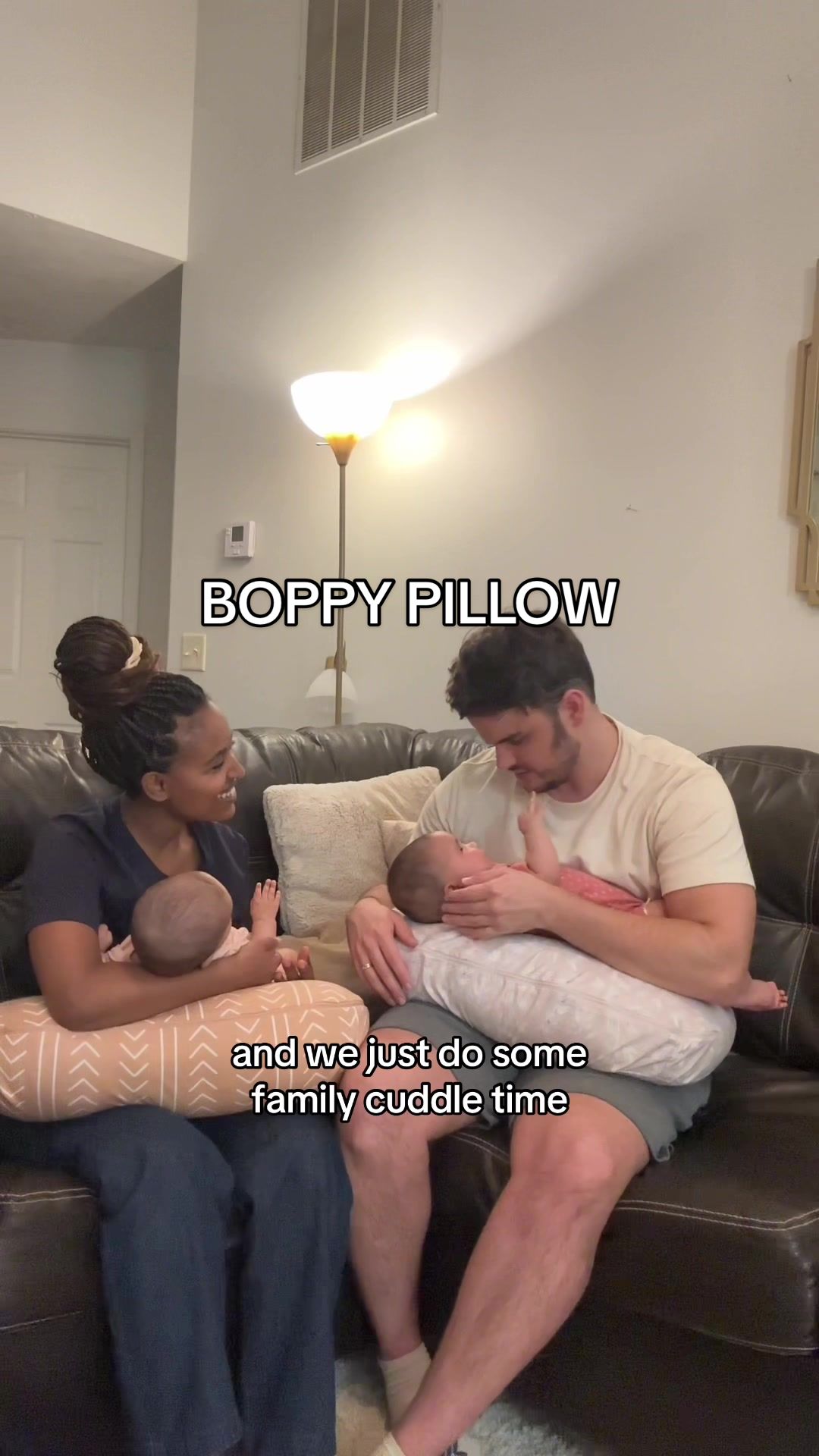TikTok post by @karisbellofficial for Boppy Italia. Caption reads: The new Boppy Pillow is twin mom-approved! #ad....