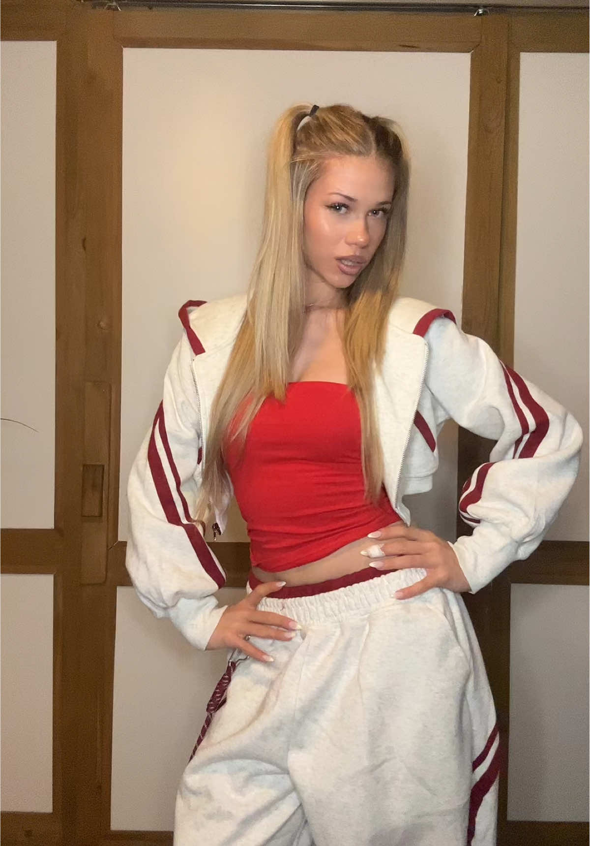 TikTok post by @official_julia_pytel for Aelfric Eden. Caption reads: Tracksuit from @aelfriceden_official ❤️🫶🏽....
