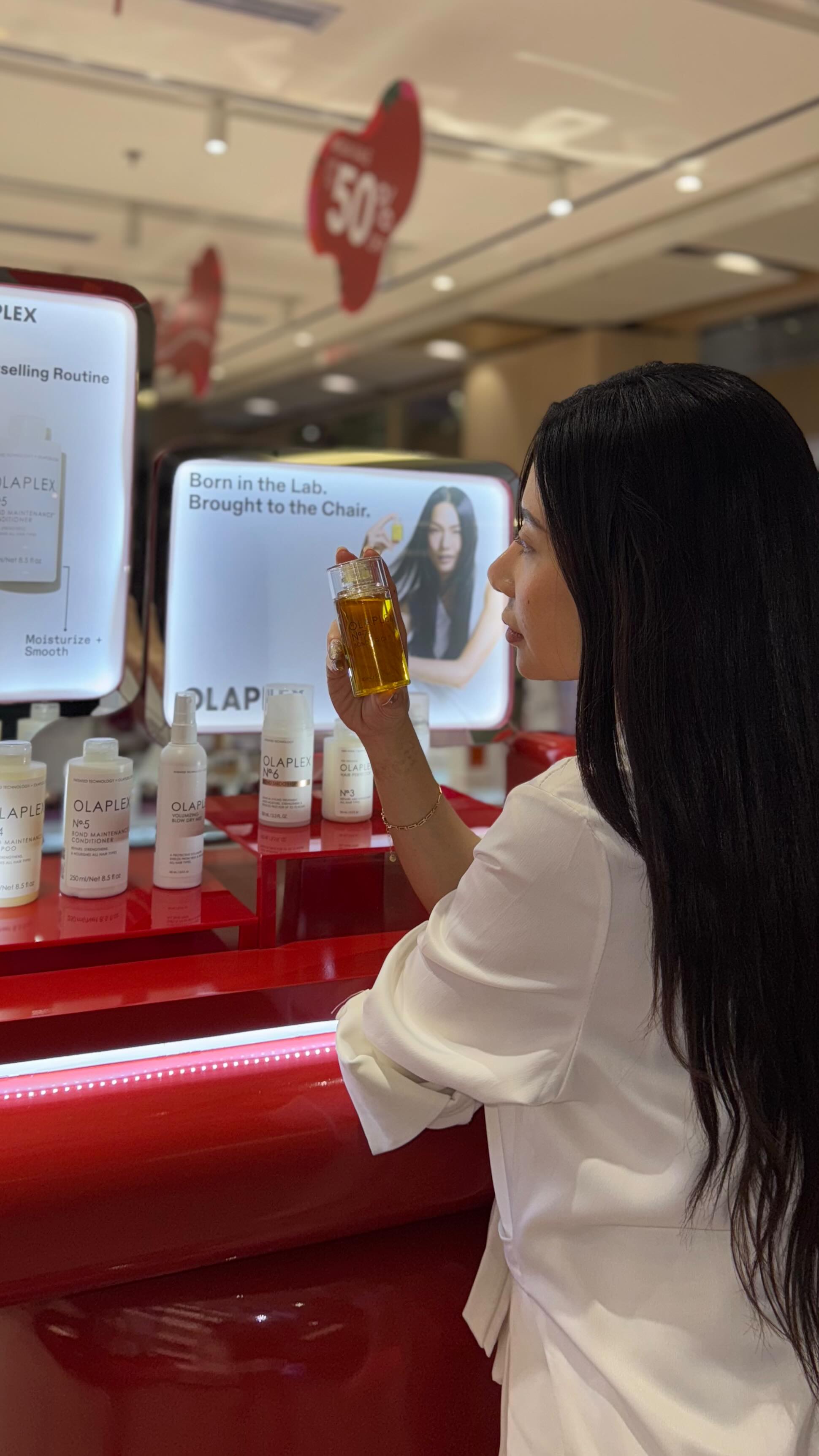 Instagram post by @graciellaks for OLAPLEX. Caption reads: enjoy up to 22% off all @olaplex.indonesia items....