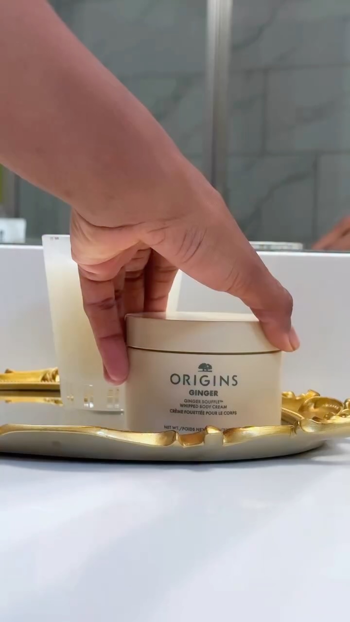 Instagram post by @aissatatdiallo for Origins. Caption reads: Holiday self-care starts here Shop @Origins Ginger....