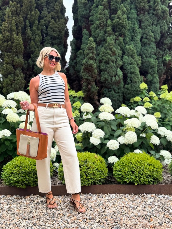 Instagram post by @alice_inthe_looking_glass for Sarah Haran. Caption reads: Matching my outfit to Nick’s Hydrangeas! 🌸

This....