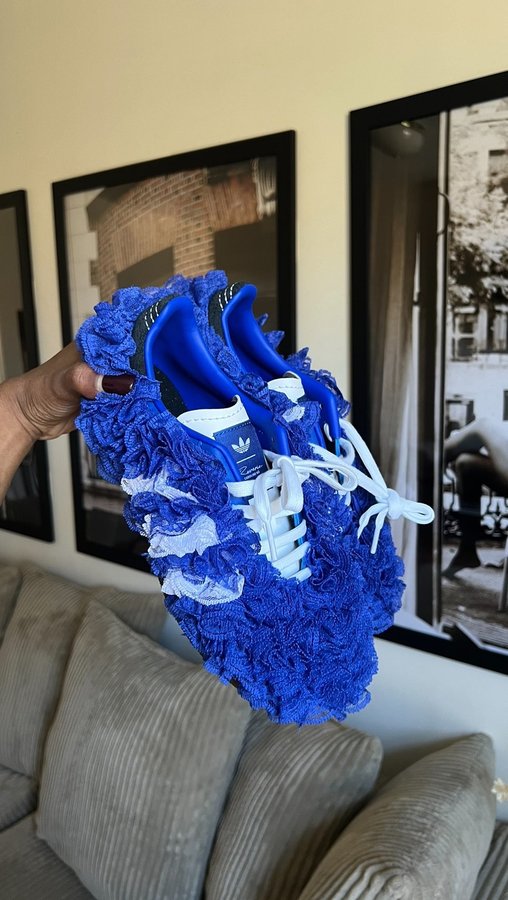 Instagram post by @sheneawalker for GOAT. Caption reads: #goatpartner I got the Caroline Hu Sambas from....