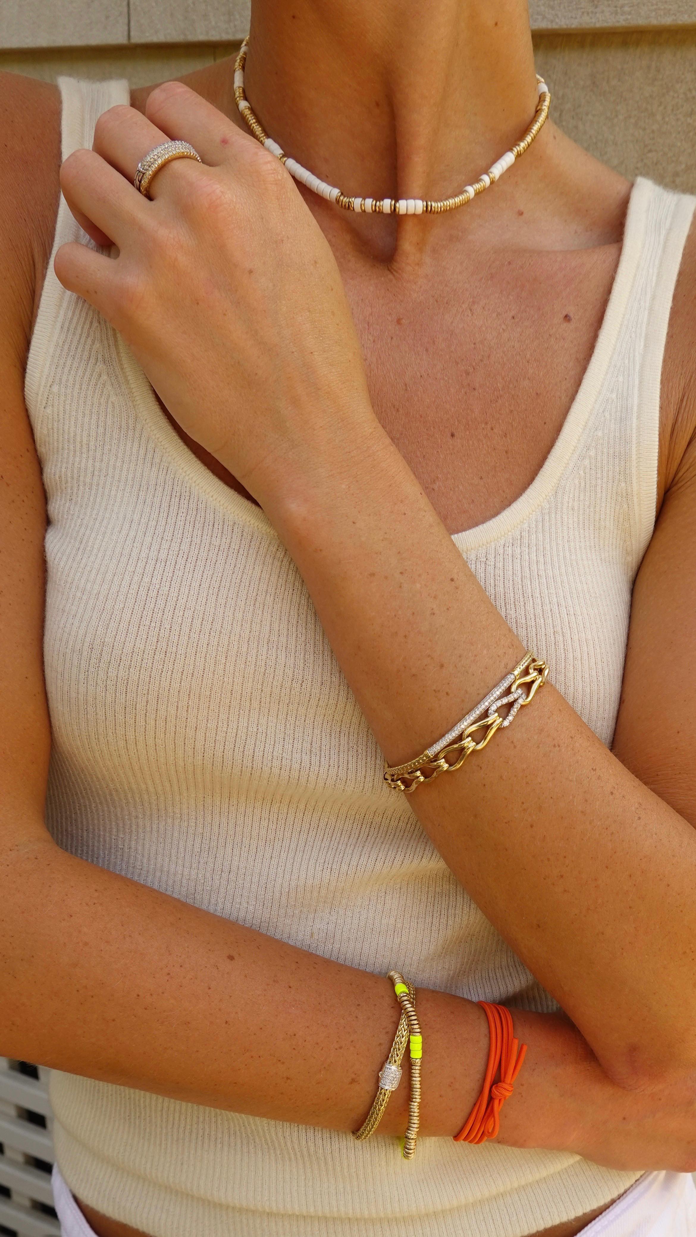 Instagram post by @livyduncan for John Hardy. Caption reads: my summer stack strategy @johnhardyjewelry....