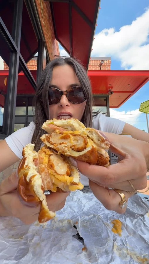 Instagram post by @katenorkeliunas for Sheetz. Caption reads: Flew to Pittsburgh. Watched a sandwich get....