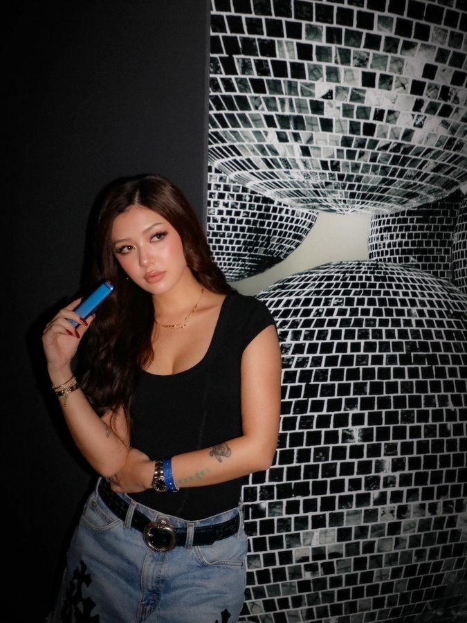 Instagram post by @niina__official for HYPEBEAST. Caption reads: [...] Captured moments at the glo booth....