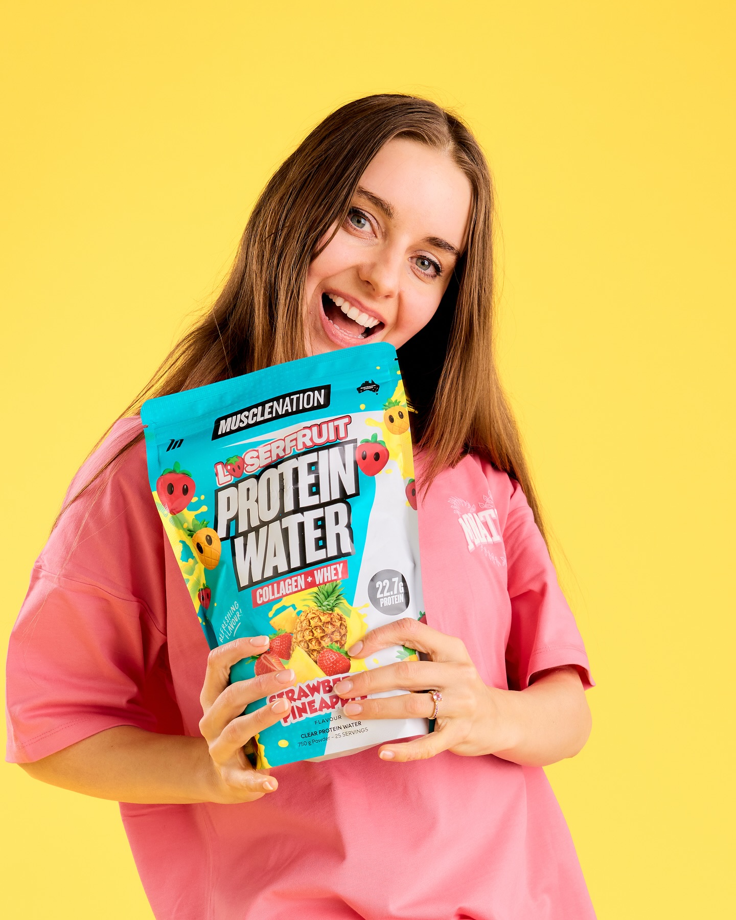 Instagram post by @loserfruit for Muscle Nation. Caption reads: SO excited to FINALLY share that I've teamed up....