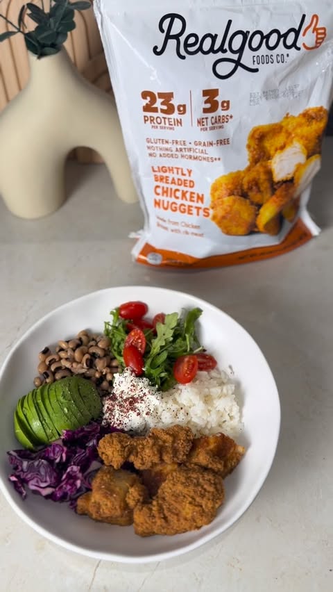 Instagram post by an influencer for Real Good Foods Co.. Caption reads: Easy, high-protein meals that actually fit into....