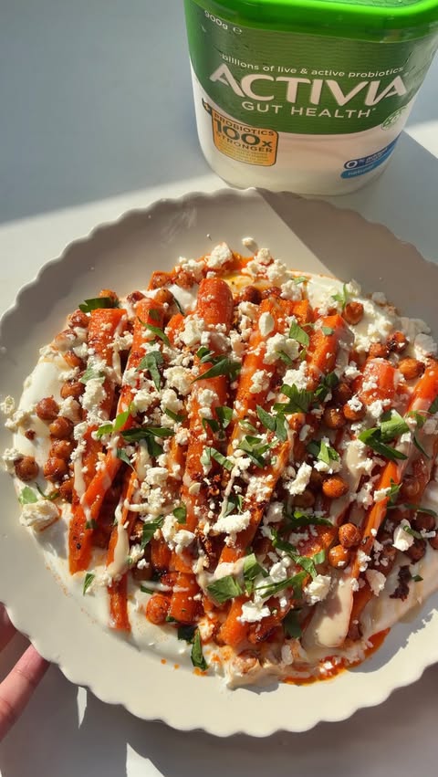 Instagram post by @veainthekitchen for Activia. Caption reads: [...] carrots and chickpeas with feta and....