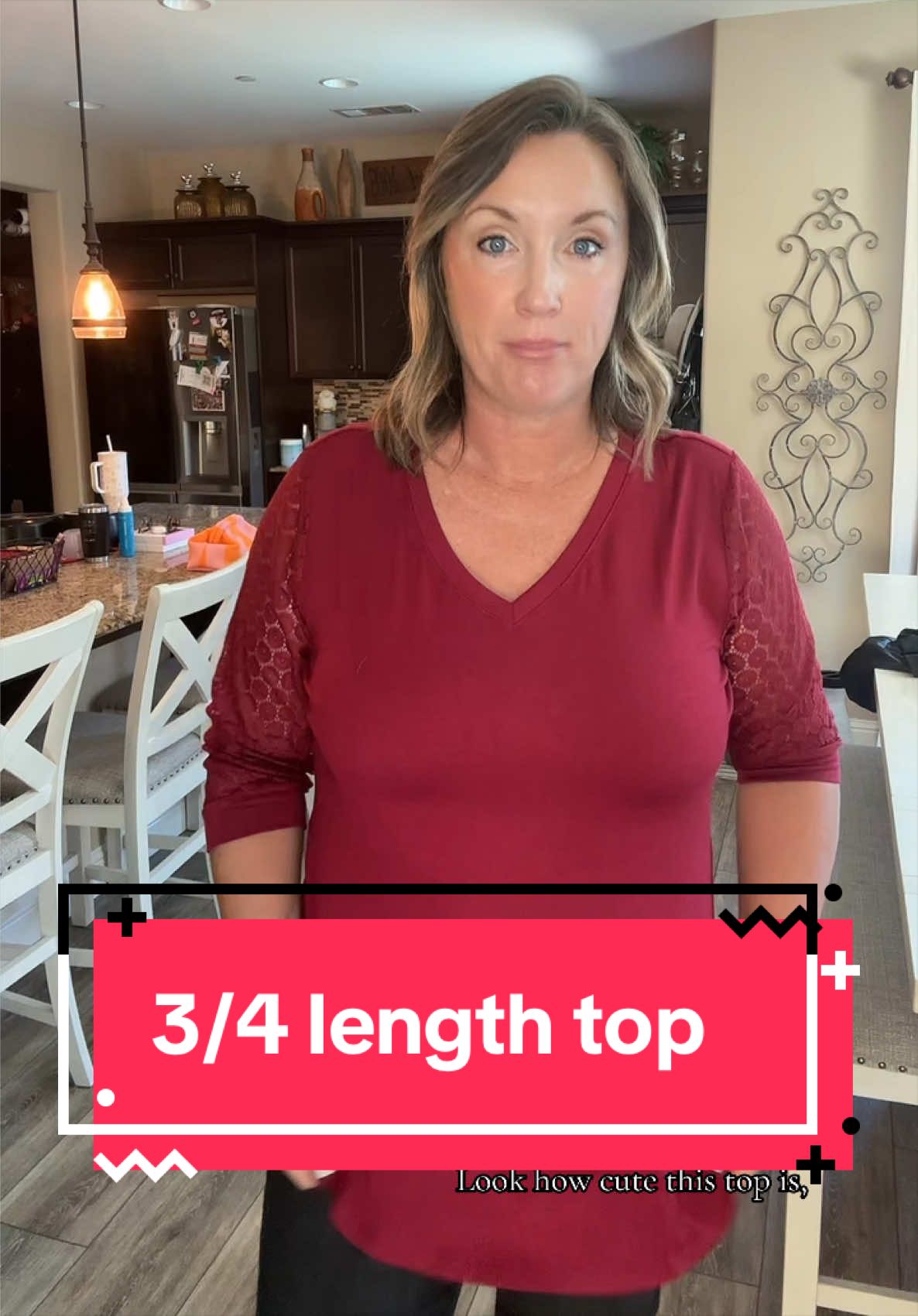TikTok post by @kristinhaydock for WIHOLL FASHION. Caption reads: What an elevated basic tee! @WIHOLL FASHION....