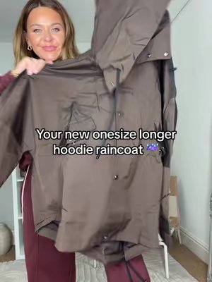 TikTok post by @x17kells for PUFFIT UK Shop. Caption reads: Your New Onesize longer line hoodie raincoat....