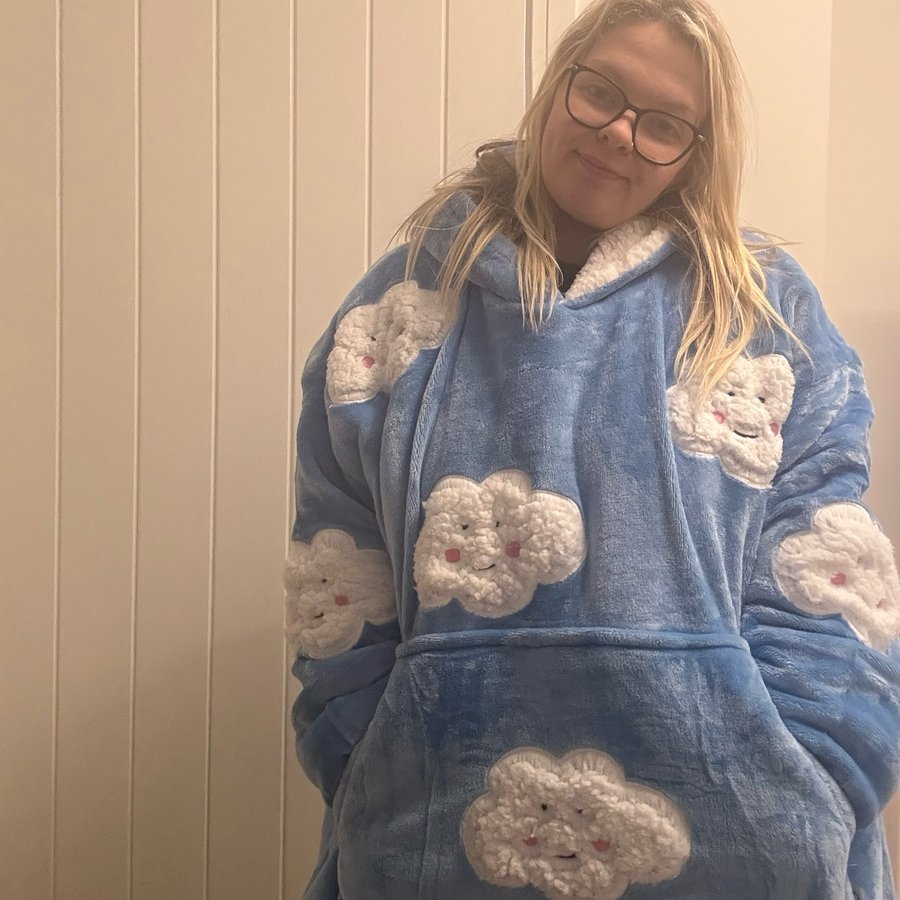 Instagram post by @ronnieandmama for The Oodie. Caption reads: ☁️ Wrapped in pure comfort ☁️
Nothing beats....