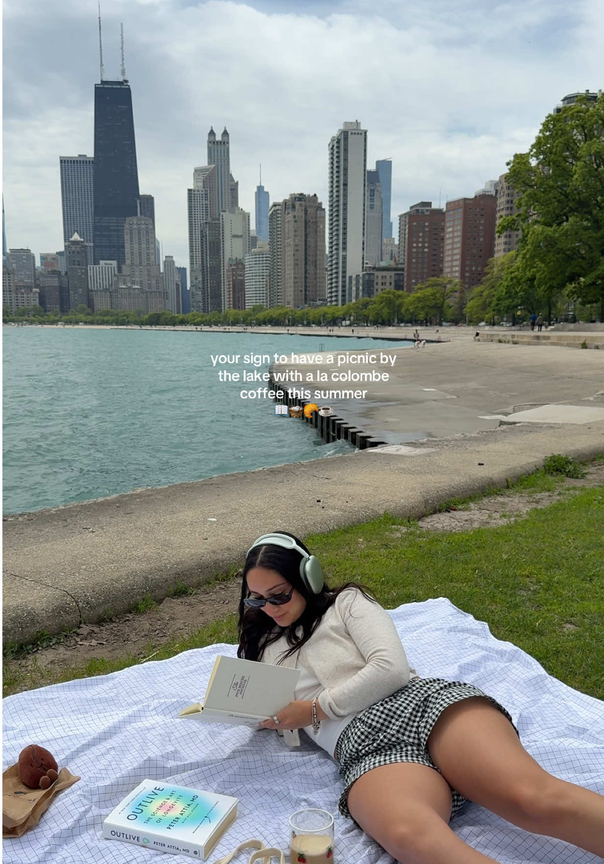 TikTok post by @nicoleesierraa for La Colombe Coffee. Caption reads: Chicago lakeside morning ritual, elevated ☕️📖✨🥐....
