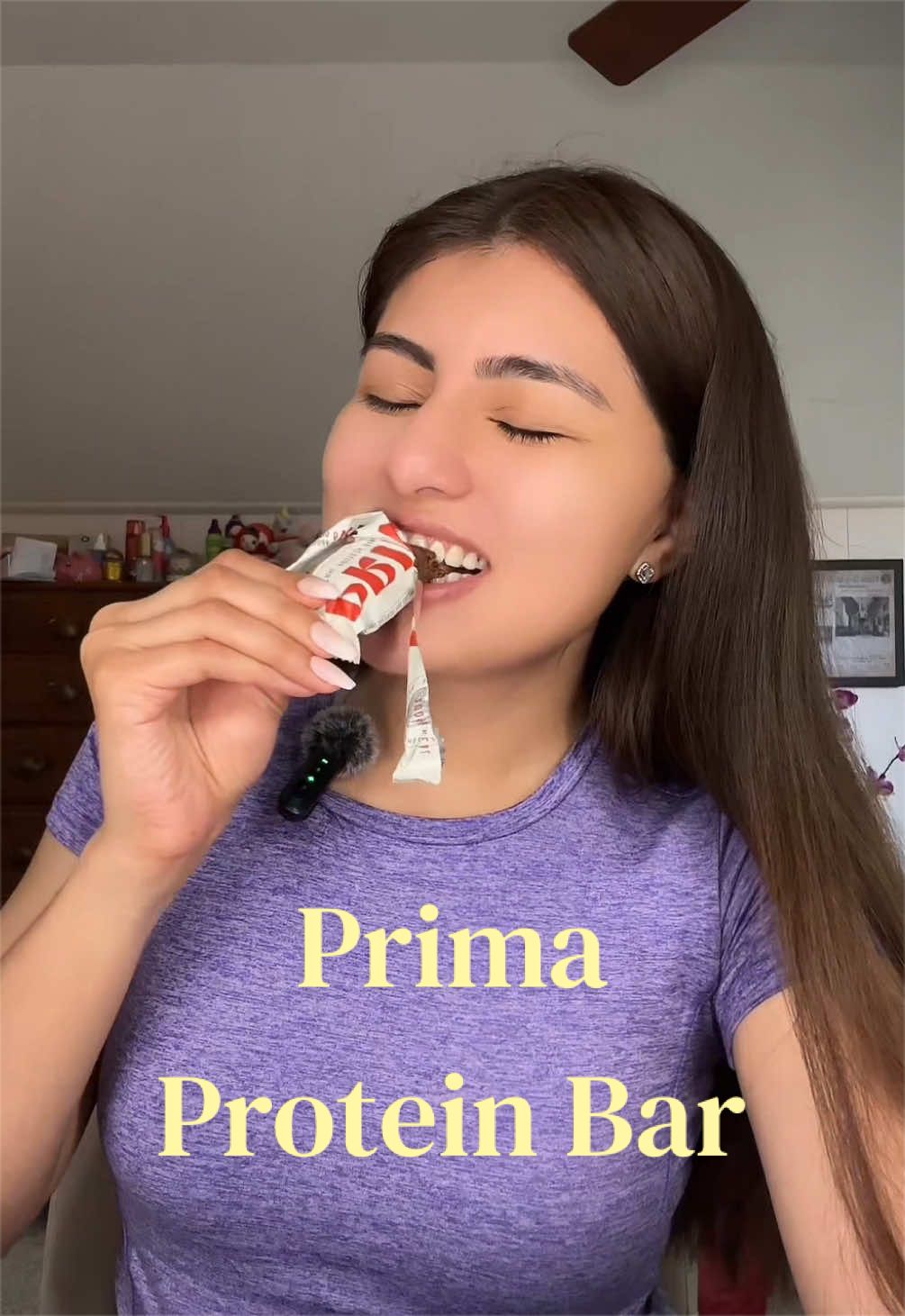 TikTok post by @creator.yitz for PRIMA Ancestral Protein Bar. Caption reads: [...] look forward to eating 😌🍫✨ @PRIMA....
