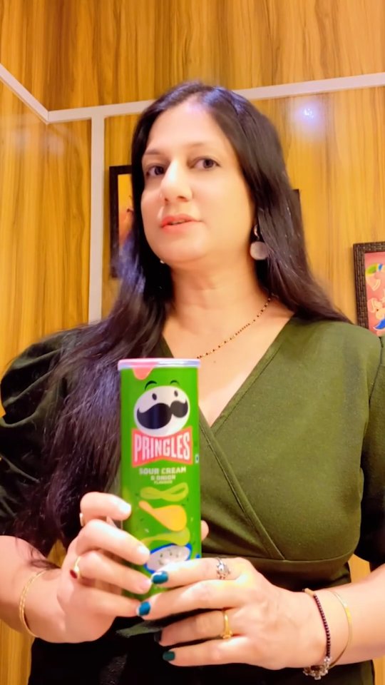 Instagram post by @monika_joshi81 for Pringles. Caption reads: Calling all selfie pros! 📸Here’s the challenge....