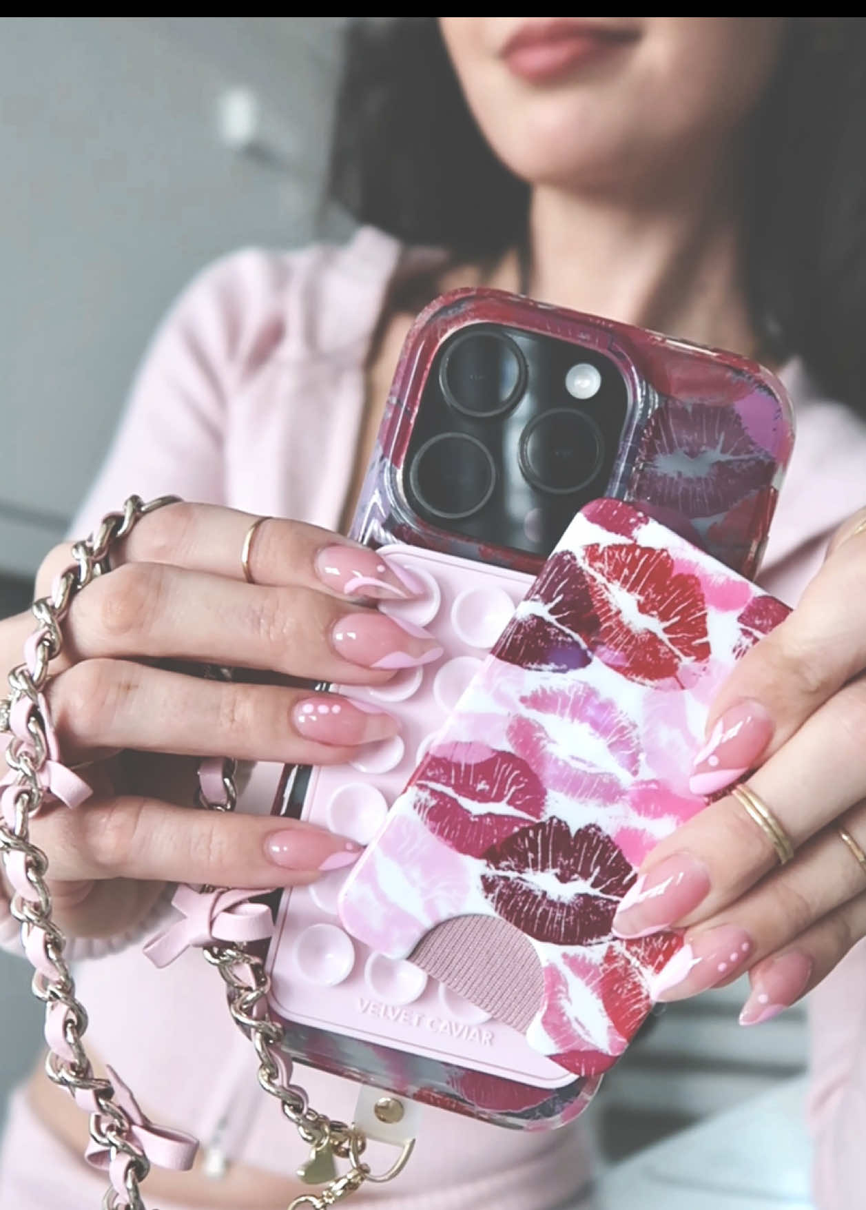 TikTok post by @kouklitsa_ for VELVET CAVIAR. Caption reads: [...] least do it with a cute case 💋🎀🫦....