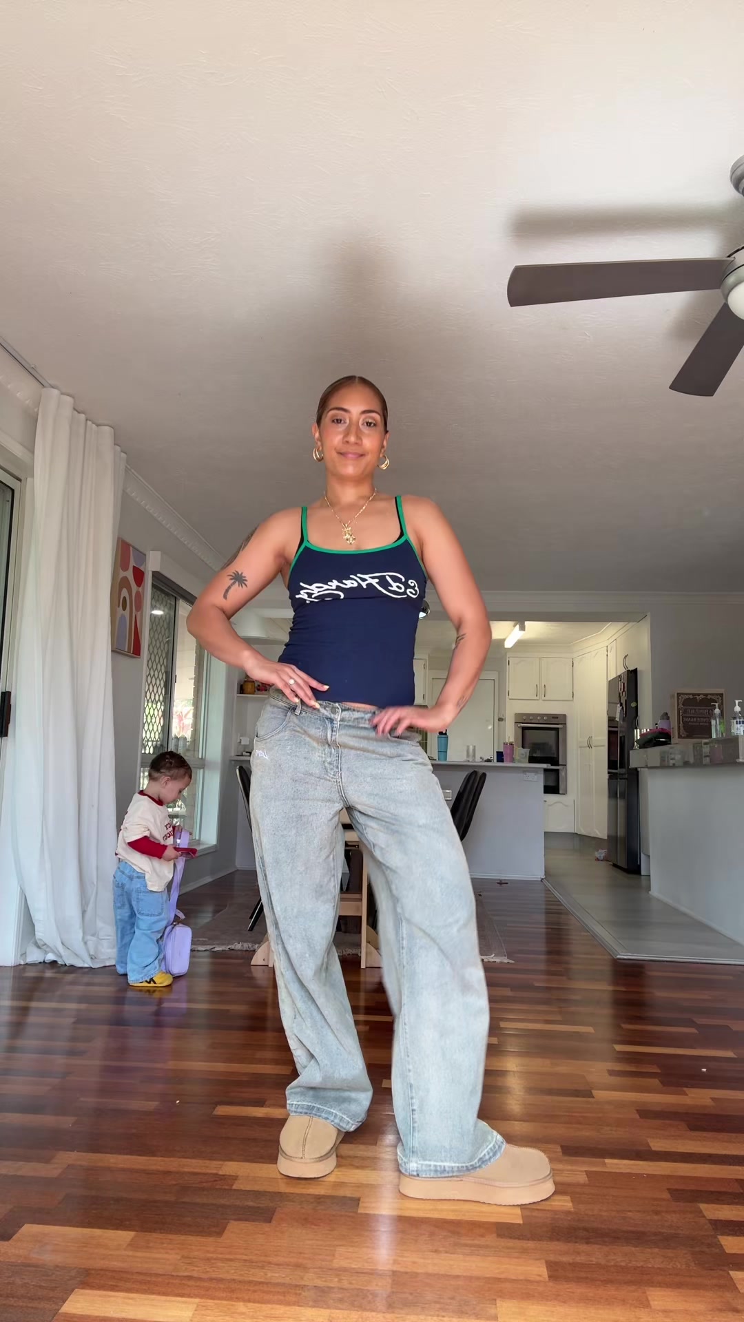 TikTok post by @valaree_ahern for Culture Kings. Caption reads: Mom fit 💙 @Culture Kings dc: VALAREECRIS to save....