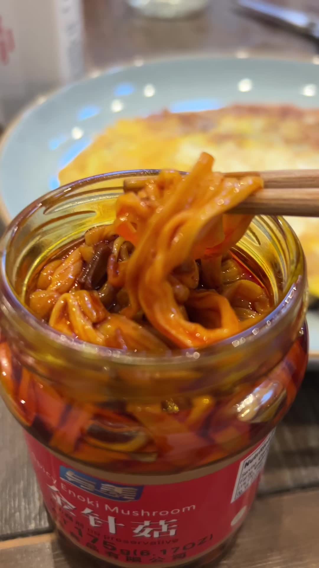 TikTok post by @cheerzyshop for Yami. Caption reads: [...] #spicytok #enokimushroom #viralsnacks @Yami.....