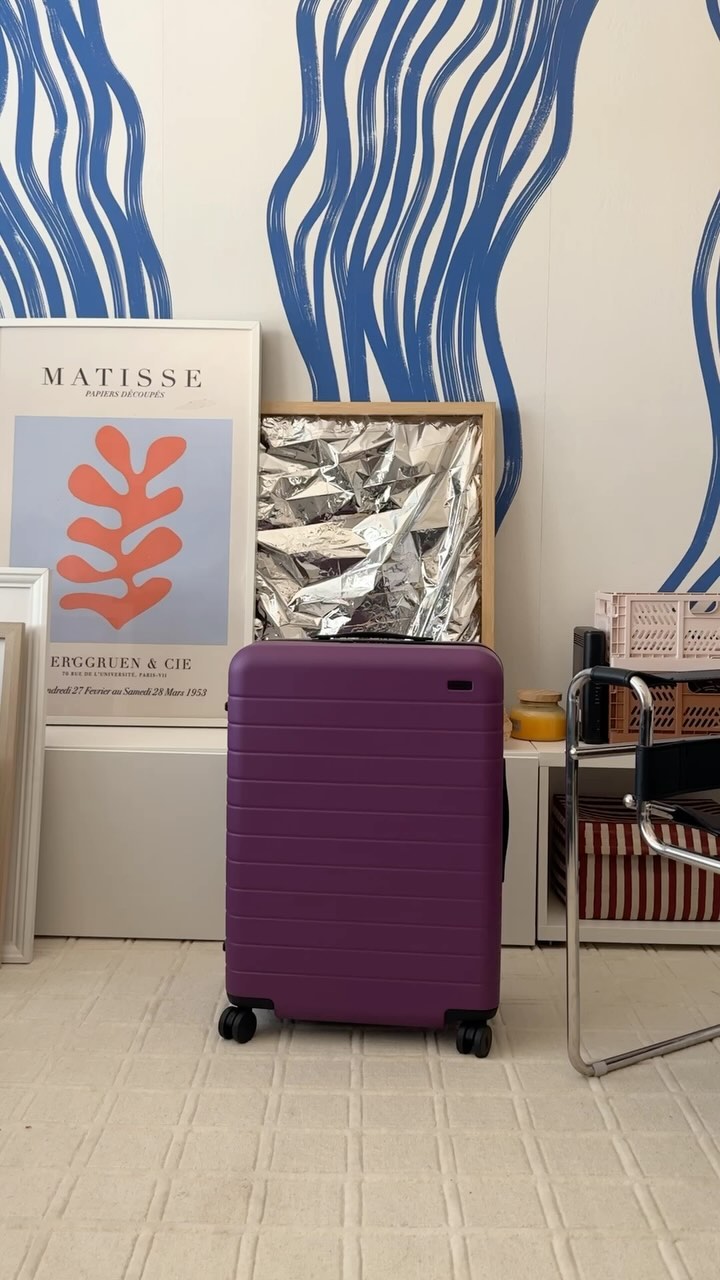 Instagram post by @sareish for Away. Caption reads: Purple has entered the chat 💜✨ Whether it’s....