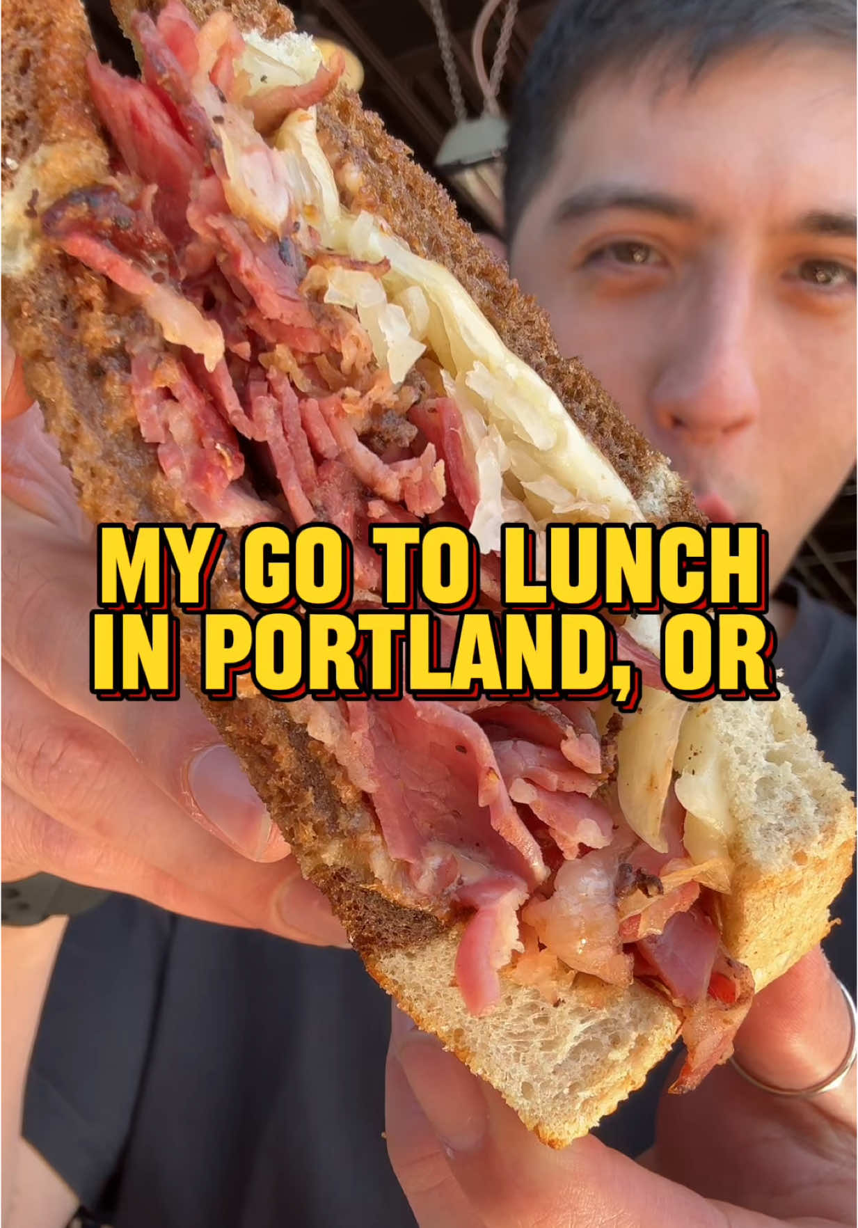 TikTok post by @pdxfoodfinds for Travel Oregon. Caption reads: My go to lunch spot in Portland! @Elephantsdeli....