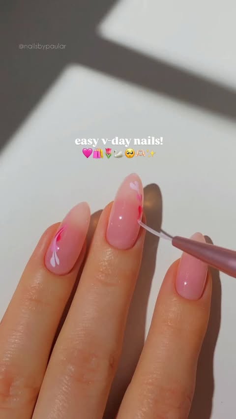 Instagram post by @nailsbypaular for BeetlesGelPolish. Caption reads: *actually* easy valentines nails! 🩷🌷🫶🏻
this is....
