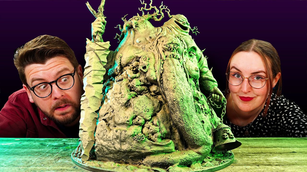 YouTube post by @MidwinterMinis for UniFormation. Caption reads: We gave it horns, toenails... and OUR OWN HANDS |....