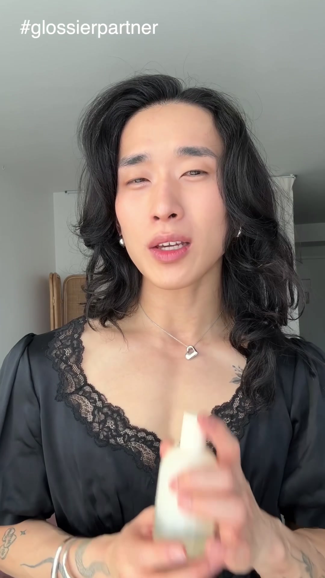 TikTok post by @ivanbaaaaah for Glossier. Caption reads: I'm pretty picky with my perfumes but the Glossier....