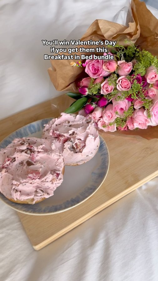 Instagram post by @hhbagels for UrbanStems. Caption reads: Our Breakfast in Bed bundle with @urbanstems is....