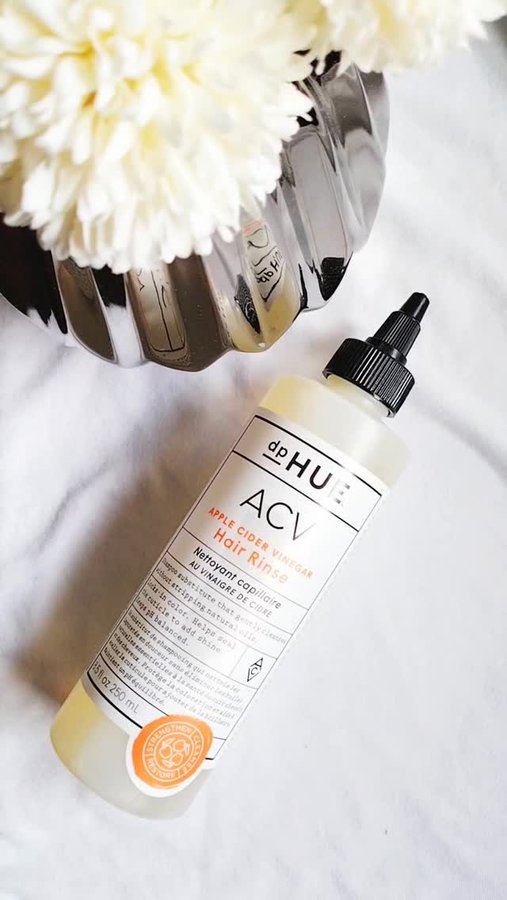 Instagram post by @alissa.denae for dpHUE. Caption reads: My go-to hair secret is definitely the Dp HUE ACV....