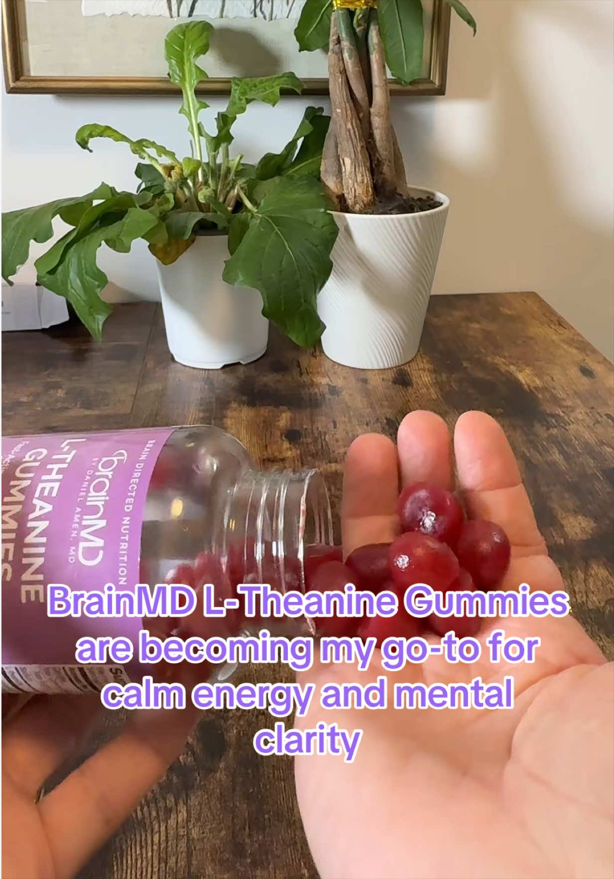 TikTok post by @serenity_0411 for BrainMD. Caption reads: BrainMD L-Theanine Gummies are becoming my go-to....