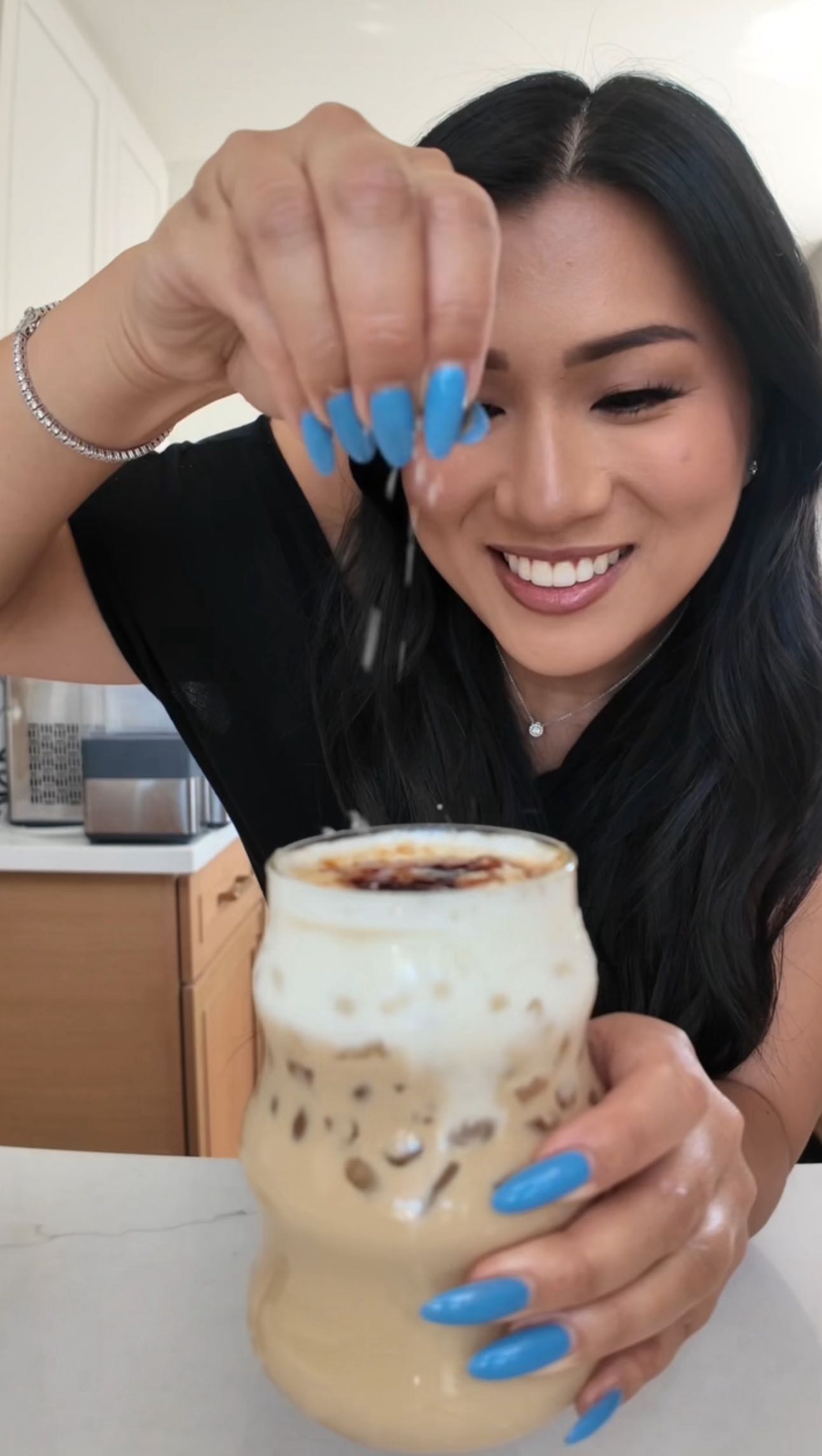 Instagram post by @mrsremiashten for Nescafe. Caption reads: #NescafePartner crème brûlée + latte = my absolute....