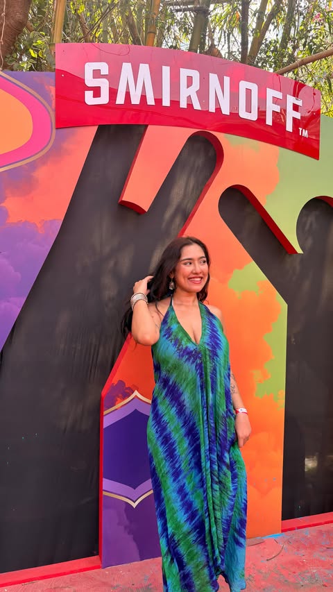 Instagram post by @shreyxa for Smirnoff. Caption reads: Holi done right with @smirnoff 🥰✨ #Invited....