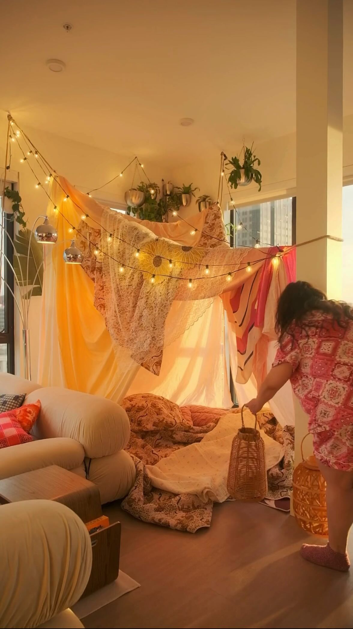 Instagram post by @kellmarcel for UScellular. Caption reads: #ad I built a dreamy blanket fort in my dining....