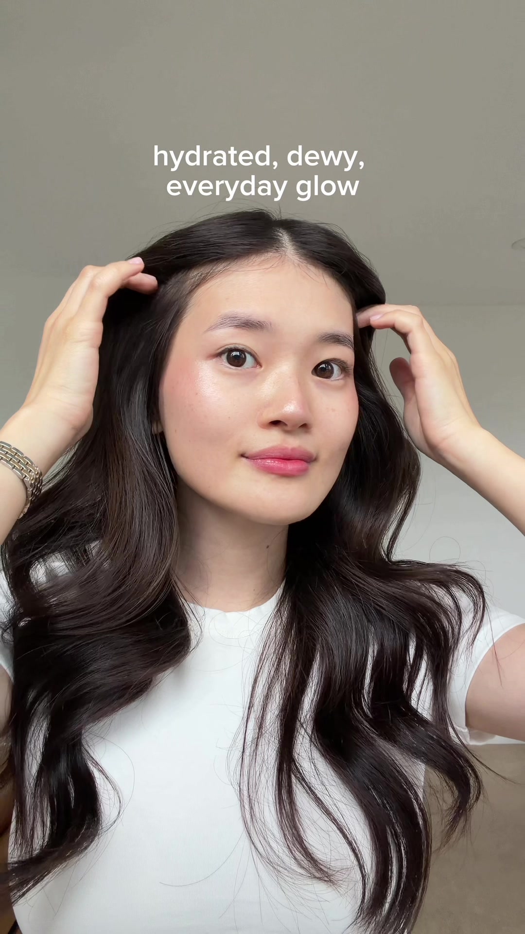 TikTok post by @kikakiim for Sephora. Caption reads: My glow-boosting SPF🫶🏻 available at @sephora ✨....