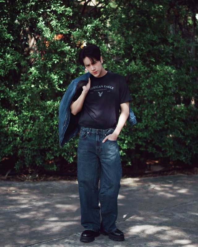 Instagram post by @nanon_korapat for American Eagle. Caption reads: gentle vibes and Ultra Baggy fit. @americaneagleth....