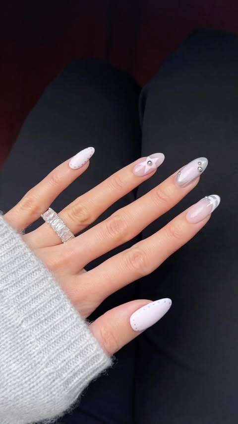 Instagram post by @nailsbyalsn for Grown Alchemist. Caption reads: [...] a pink + silver mixed mani 💗⛓️⭐️....