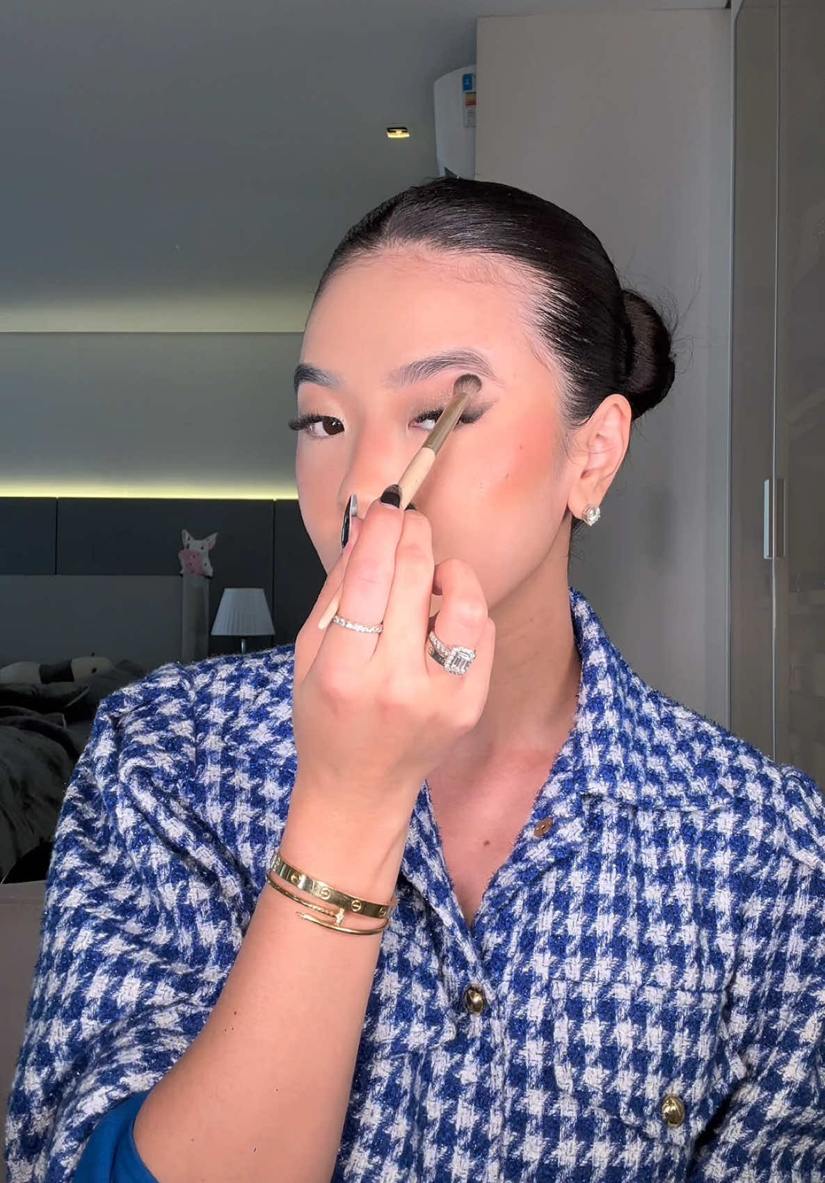 TikTok post by @gi_sayuri for Carolina Herrera. Caption reads: eyes makeup with @Carolina Herrera , new in,....