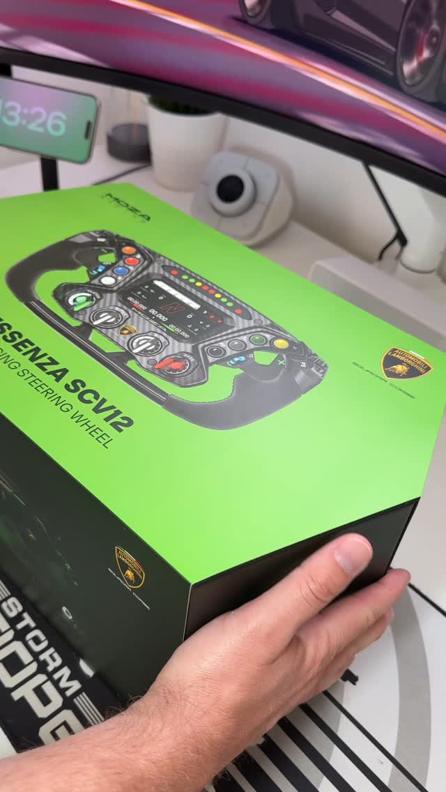 Instagram post by @developeradam for MOZA Racing. Caption reads: This is the closest I’ll ever get to a Lambo 😅....