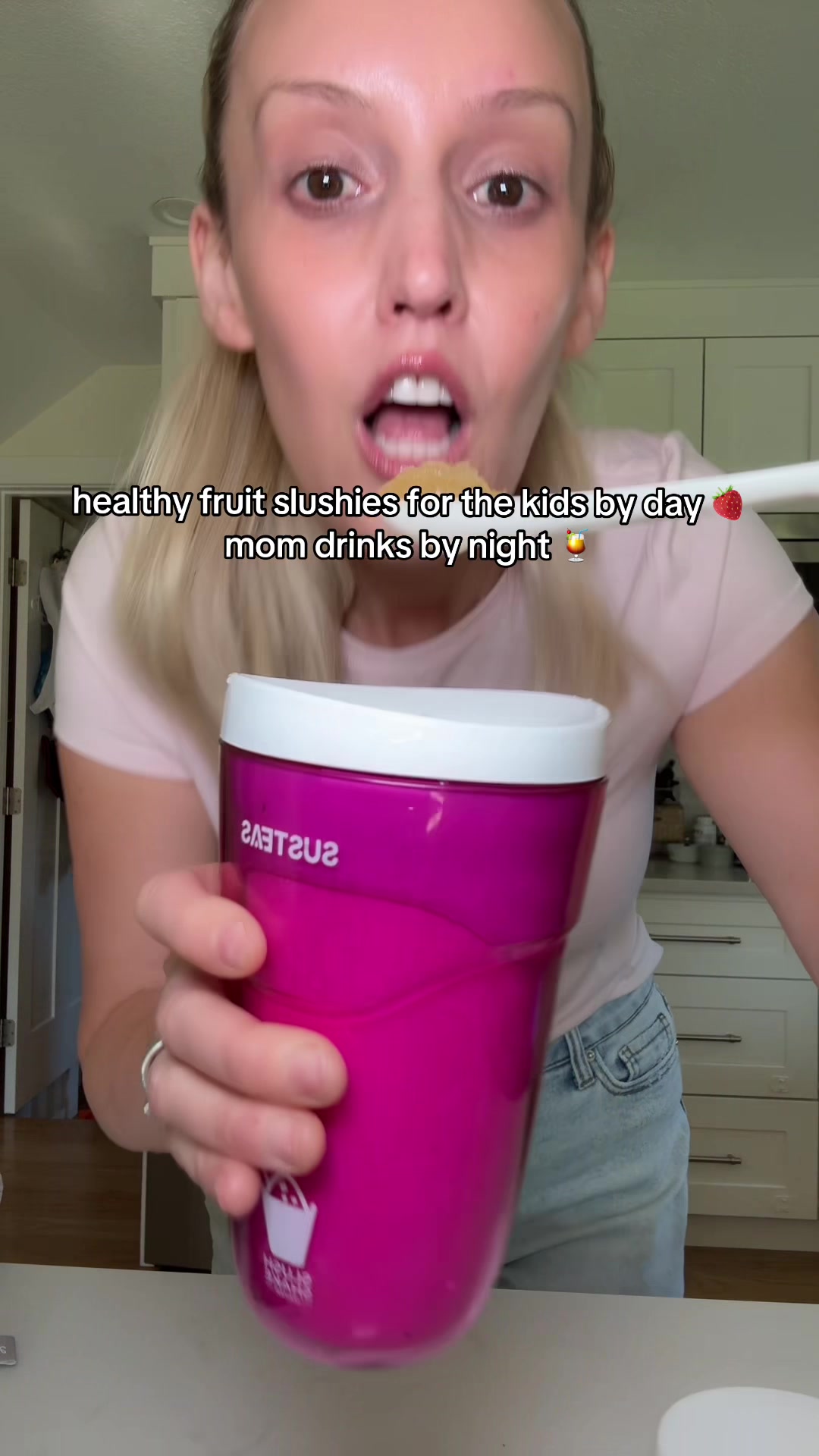 TikTok post by @retailrachel for SUSTEAS. Caption reads: [...] kids by day 🍓 mom drinks by night....