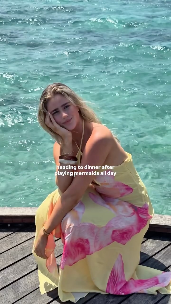 Instagram post by @sophadophaa_ for Beginning Boutique. Caption reads: in my fave dress @beginningboutique 🧜🏼‍♀️🏝️🌺....