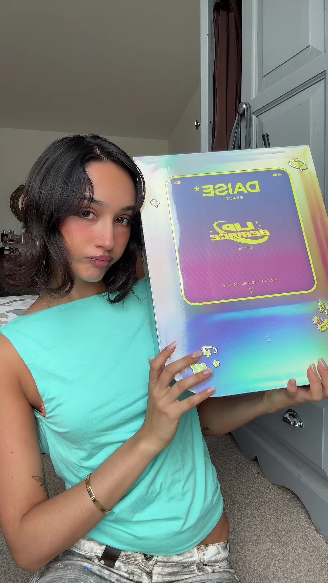 TikTok post by @bellagazm for daisebeauty. Caption reads: [...] omg the @Clinique colouring book 🥹....