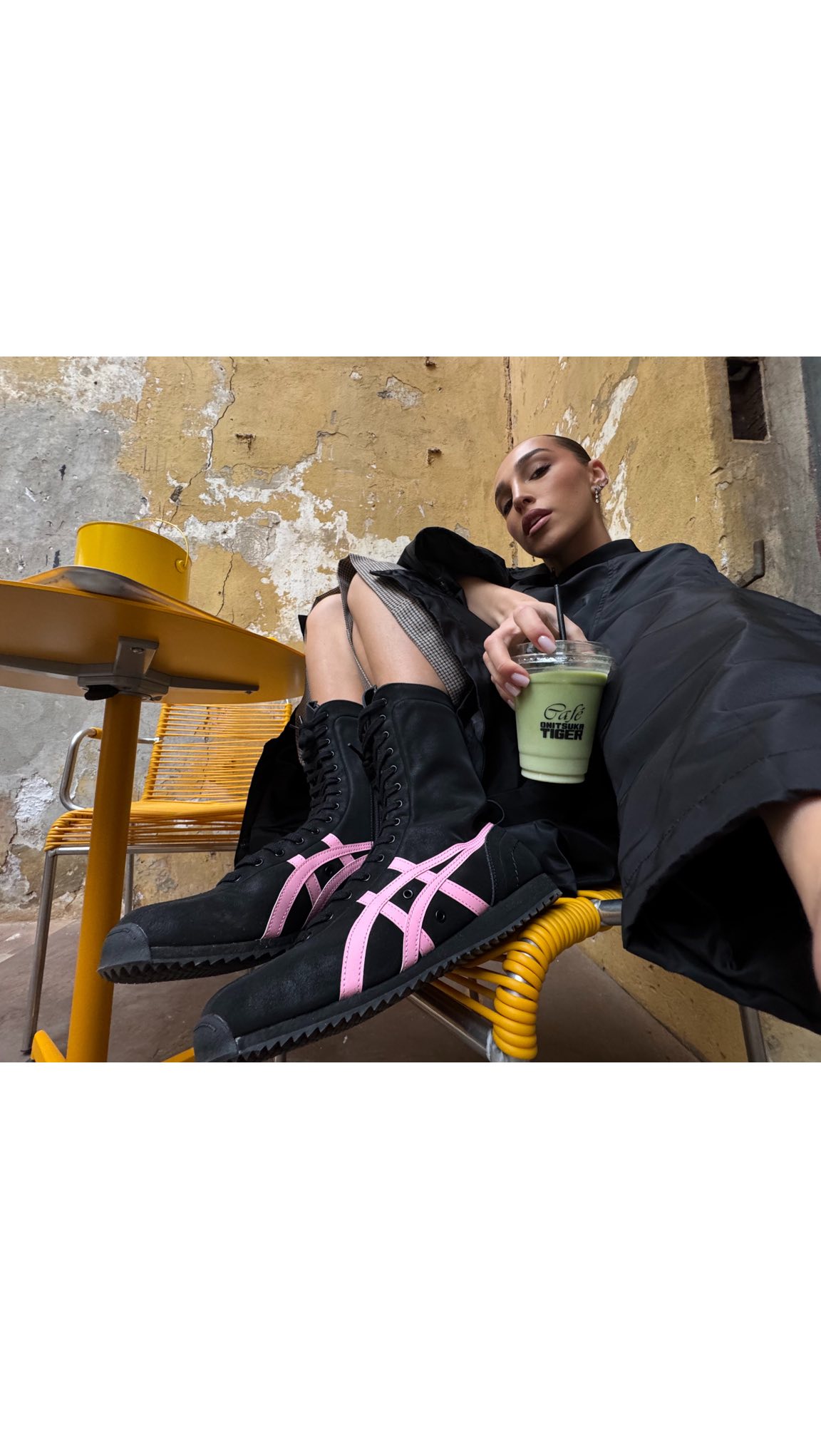 Instagram post by @ginevramavilla for Onitsuka Tiger. Caption reads: Came for the latte… stayed for the wardrobe....