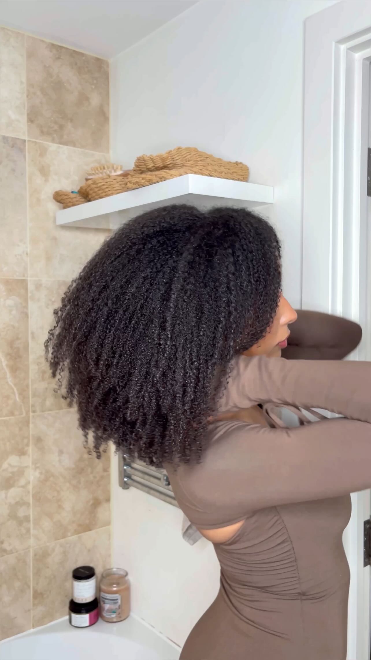 Instagram post by @hannahmendez.x for ARKIVE HEADCARE. Caption reads: [...] your curls from damage ➰ The NEW....