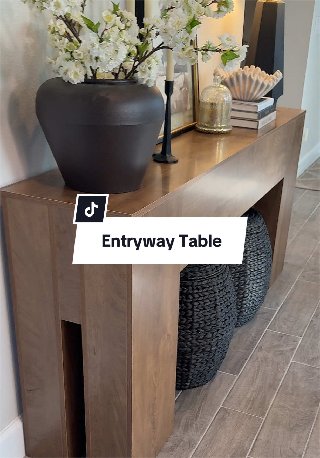 TikTok post by @reallaurakay for Tribesigns. Caption reads: [...] #entrywaytable #entrywaymakeover @Tribesigns....