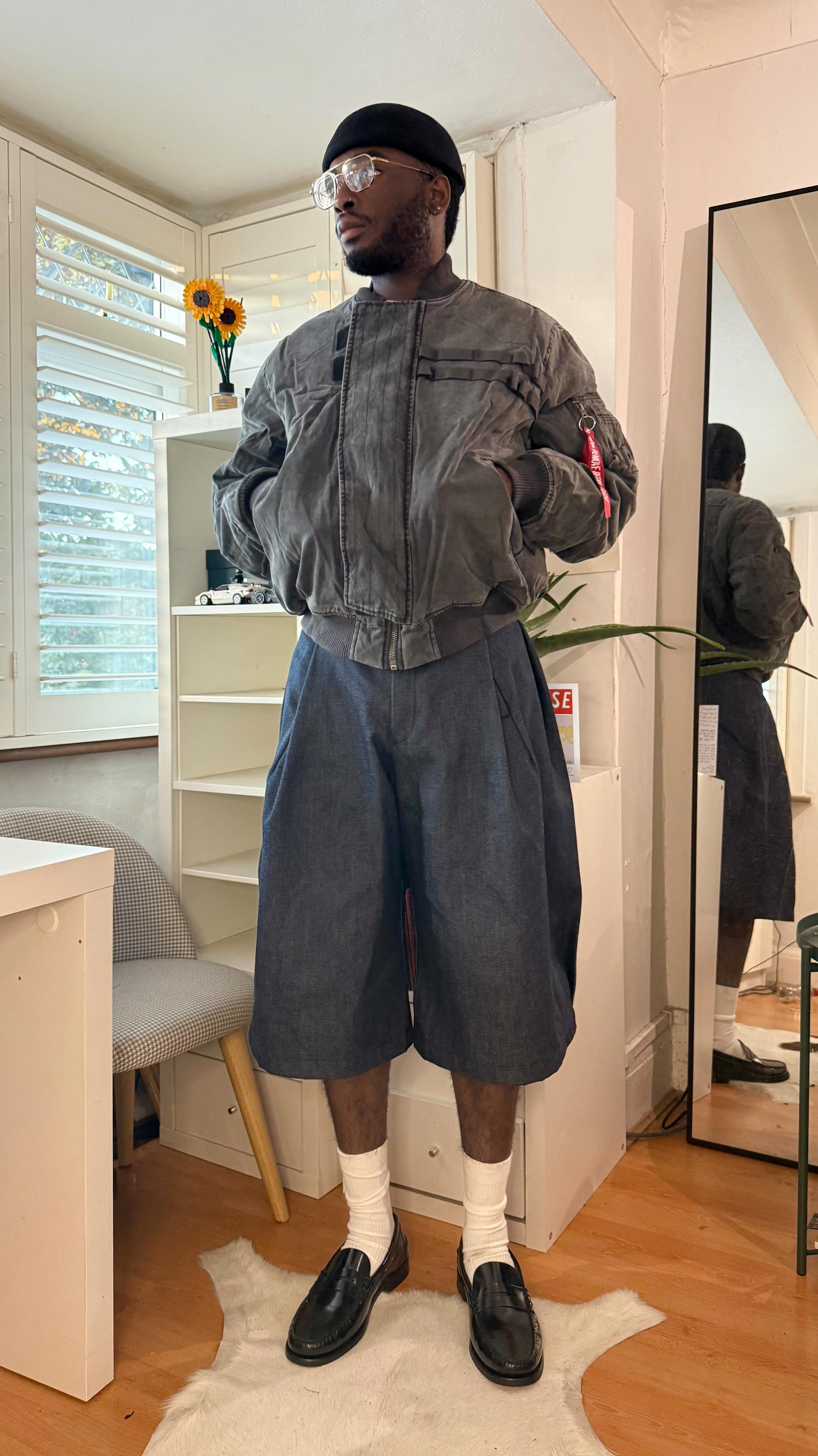 Instagram post by @dairematiluko for Alpha Industries. Caption reads: The only 3 bomber jackets you need in your....