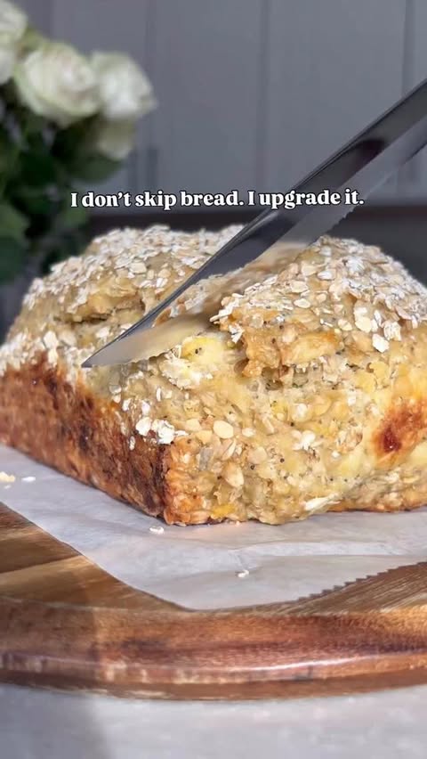 Instagram post by @abbymarie.co for King Arthur Baking Company. Caption reads: save this high protein multigrain bread recipe for....